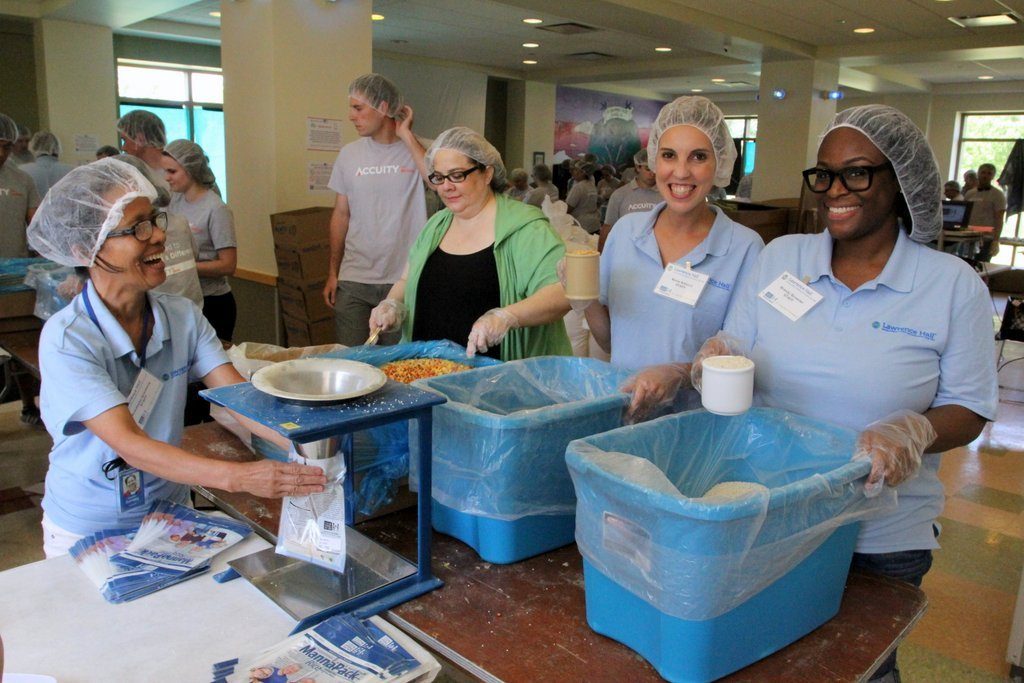 Lawrence Hall Raises $22,000, Packs Over 100,000 Meals for International Nonprofit